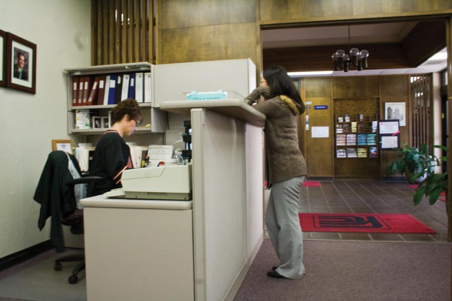 Tammy Maddox at the Office of Instruction answers questions for walk-ins of Nov.1, 2010. The office of Instruction and the Administration Building are being considered for the new DSP&amp;S location on campus.