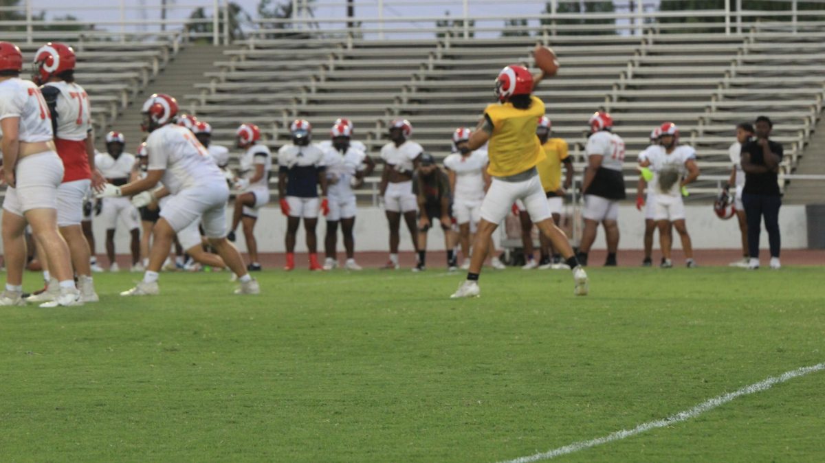 Quarterback, David Marquez, throwing a pass during practice on Sept. 4.