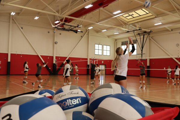 The FCC Volleyball team practices in the gym on Sept. 19. 