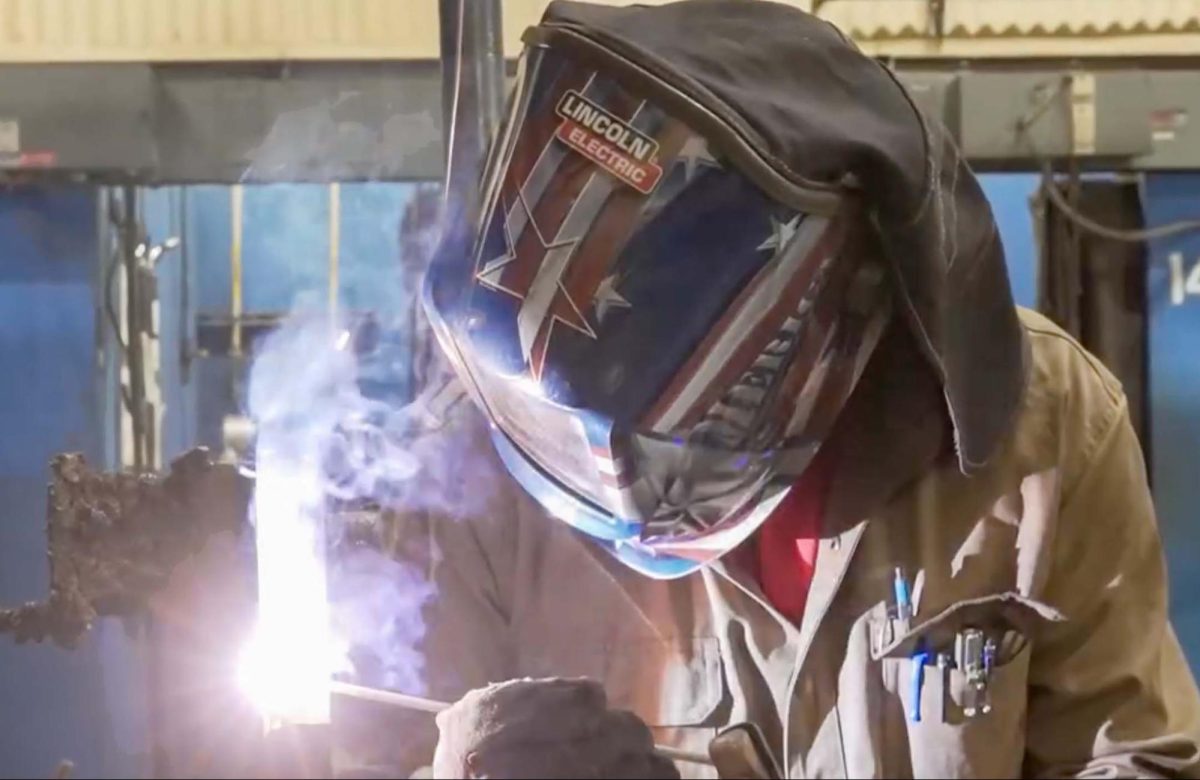 Fresno City College welding instructor Joao Lopes demonstrates the technique of welding and offers various certificates to his students on March 15.