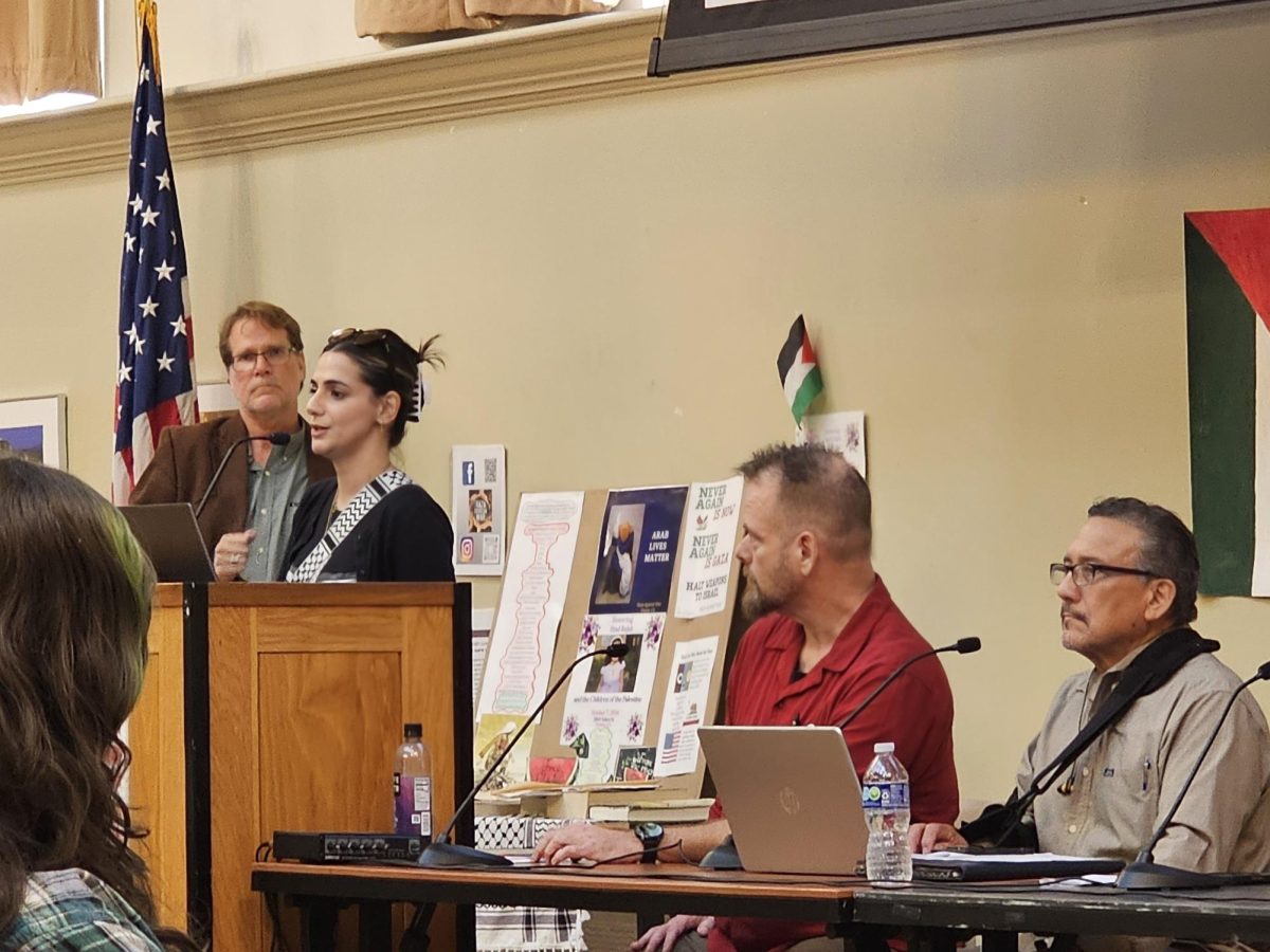 Layla Darwish speaks to audience at forum with FCC Instructor Joshua Shurley (right) and Paul Gilmore (left) on Oct. 15.