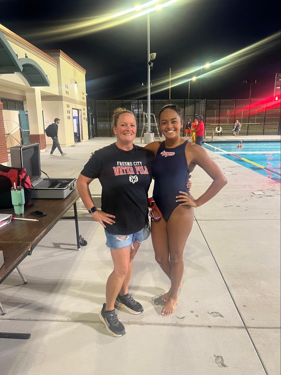 Hillary boos (left) stands next to Ruby Contreras after the
water polo game on Sept. 18.