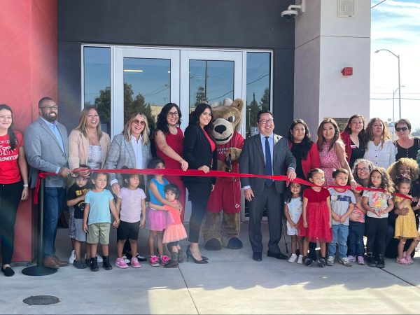 Administration and their families at the ribbon cutting ceremony in front of the new Child Development Center on Oct. 11, 2024. Photo by Candy Rivera. 

