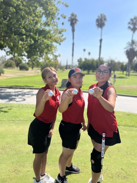 (left to right) Samaria Nounvilaythong, Jillian Thor, Camille Salmeron pose at the Buena Vista golf course  in Taft, California on Sept. 19. 