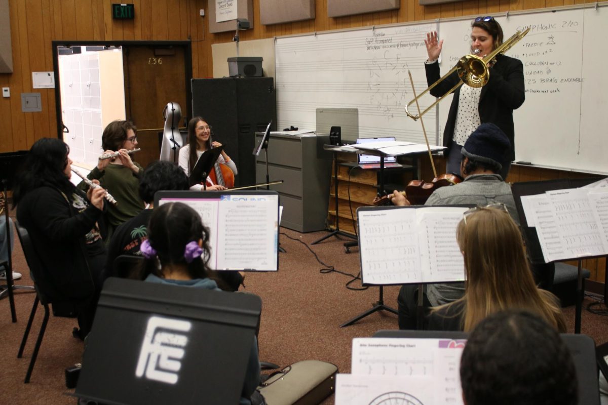 Students in Beginning Instrumental Ensemble practice instruments while following instructions from professor Barb Shinaver on Feb. 20, 2025. 