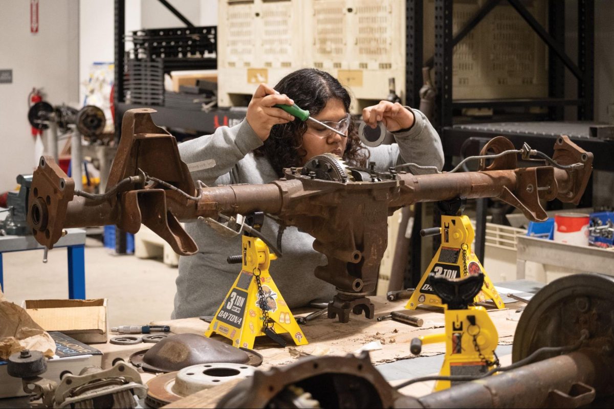 Brenda Garcia working on a rear axle at West Fresno Campus on Feb. 21, 2025.