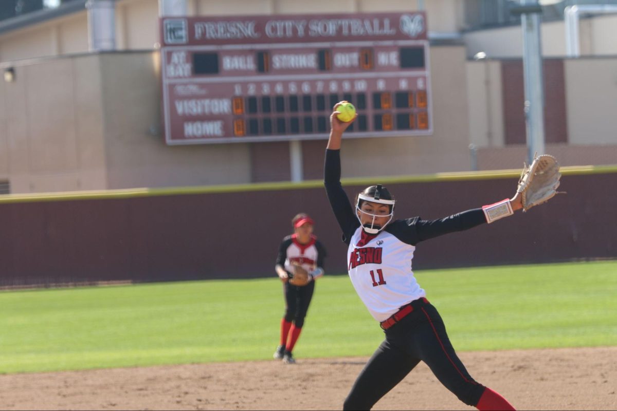 Mia Castillo No. 11 getting ready to pitch against San Joaquin Delta on Feb. 8, 2025. 
